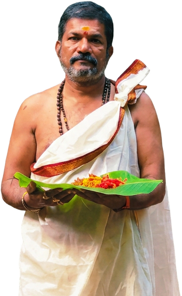 Sri Guruji Durga Prasad Garu holding sacred offerings