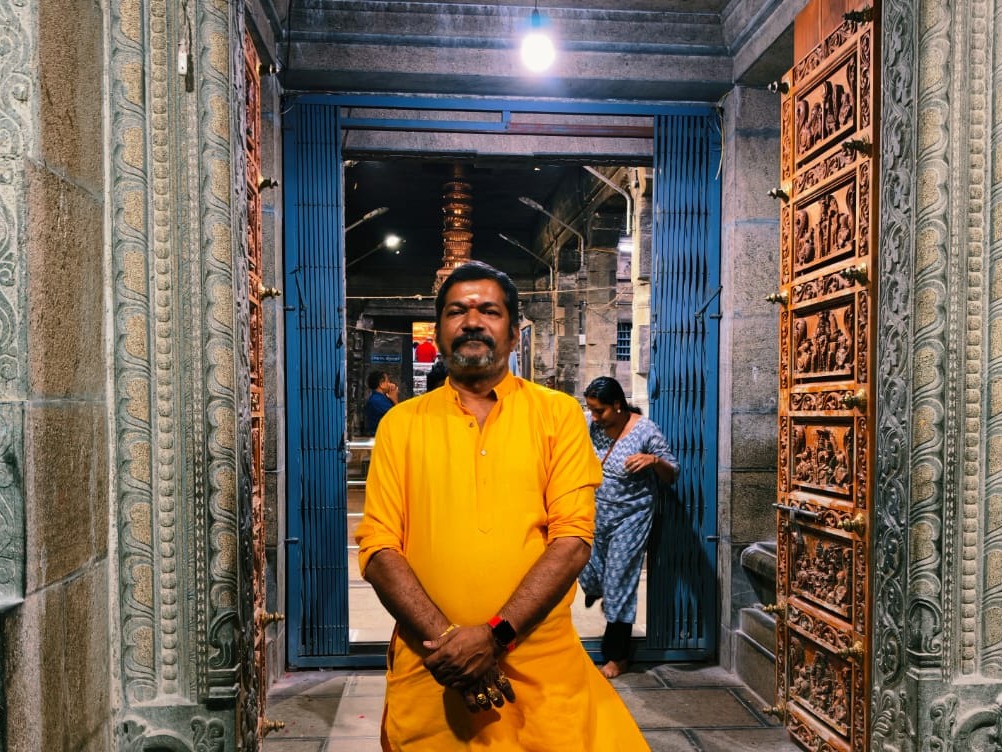 Sri Guruji Durga Prasad Garu at the sacred temple doorway